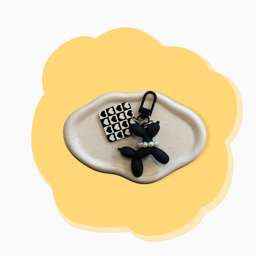 Trendy black and white balloon dog bag charm – cute keychain accessory for bags