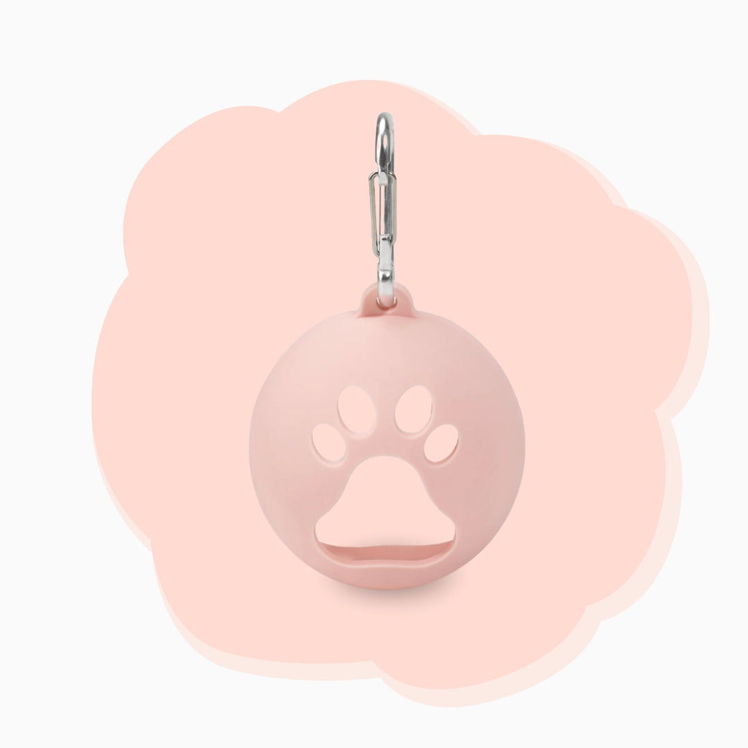Portable pink silicone dog ball holder with paw print design and metal hook