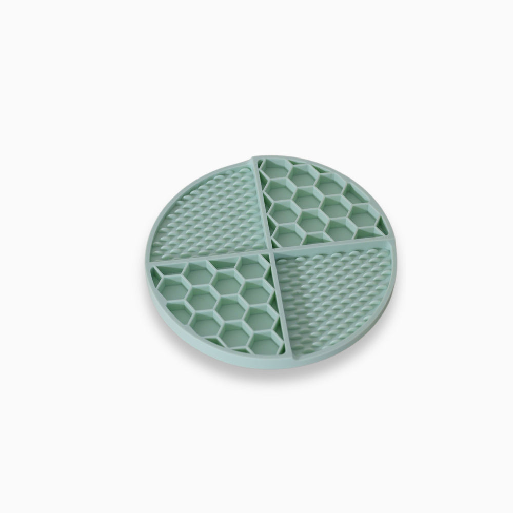Non-slip pet enrichment mat with honeycomb and circle sections – interactive slow feeder for dogs and cats.
