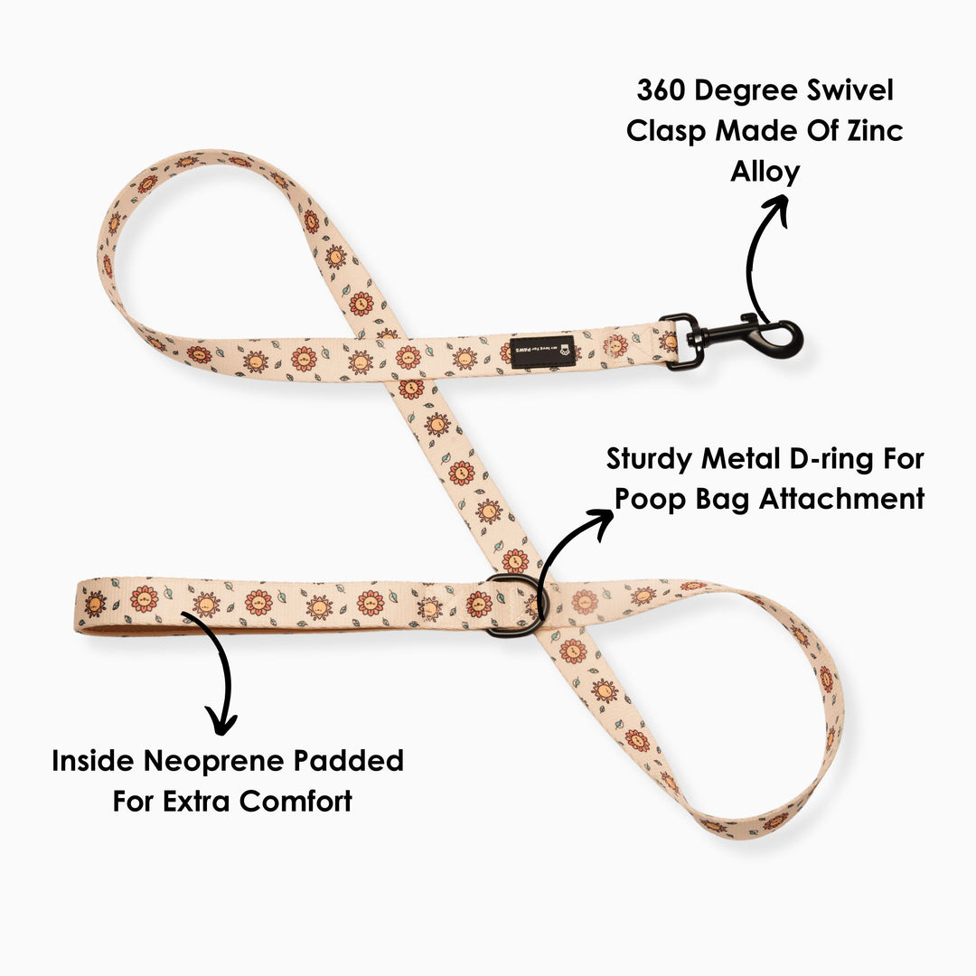 Hands-free floral dog leash clipped to jeans loop for easy walks.